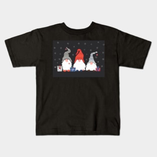 Three Christmas Gnomes with Snowflakes and Presents on Dark Grey Background Kids T-Shirt